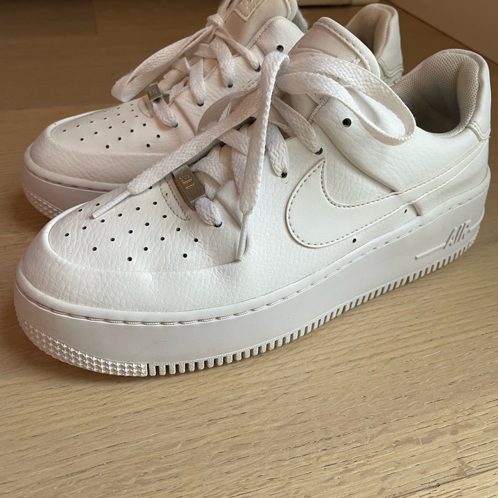 SOLD Nike Af-1 white leather shoes. Slight platform sole. Size 8 women’s.